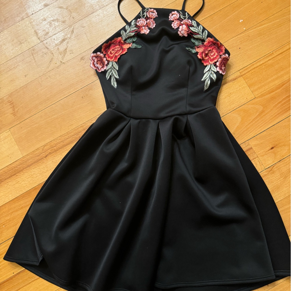 Black mini dress with embroidered flowers